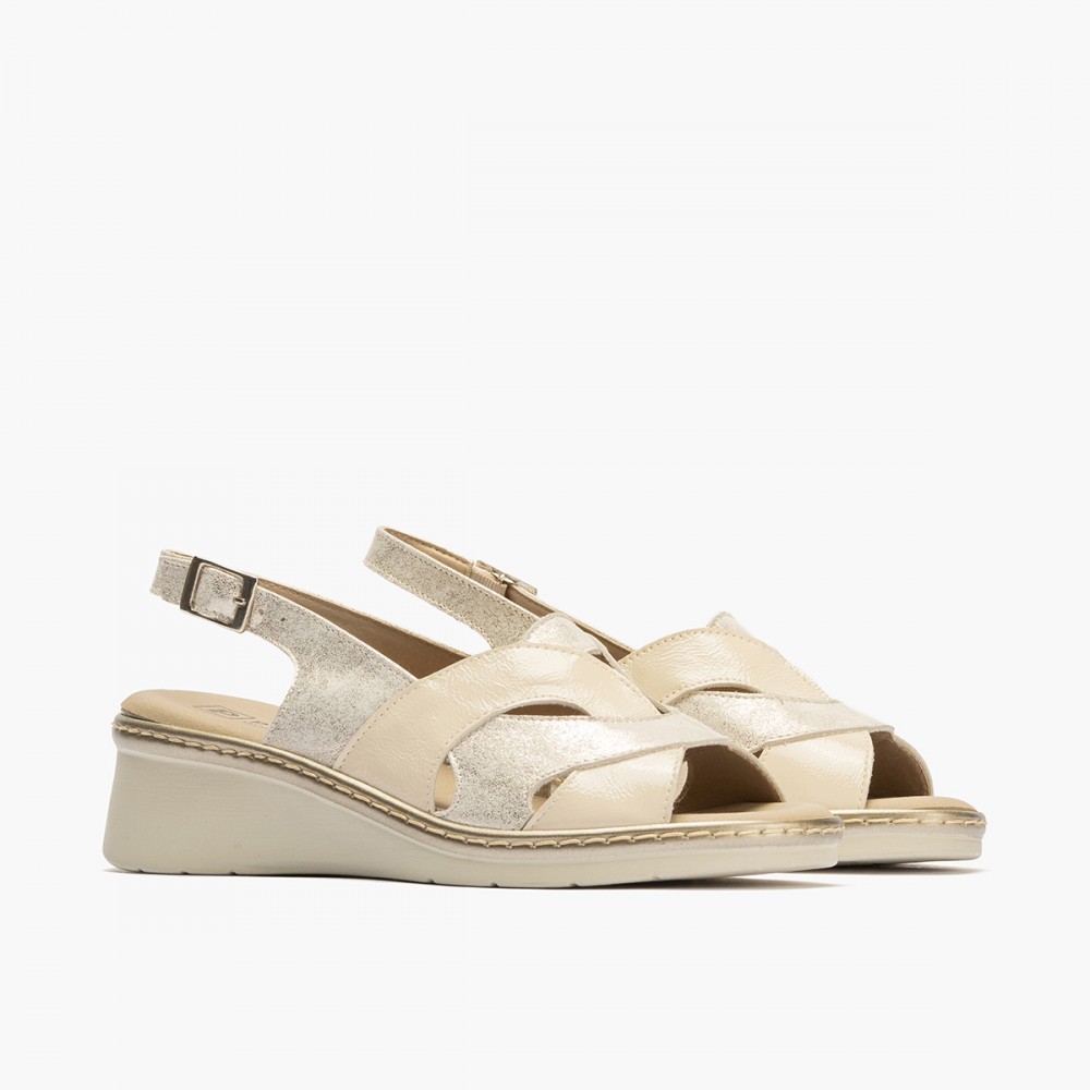 SANDALIA PIEZAS CREMA